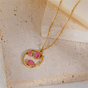 This circle stone necklace is a symbolic piece of jewelry that beautifully represents life’s journey. Designed with a polished golden ring and three delicate leaf-shaped inlays, it combines natural stones, quiet luxury, and deep meaning, making it an unforgettable accessory or gift for any occasion.