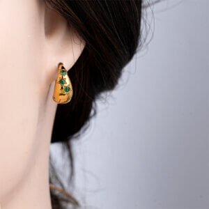 Stainless Steel Gold Star Huggie Earrings with Green Zircon